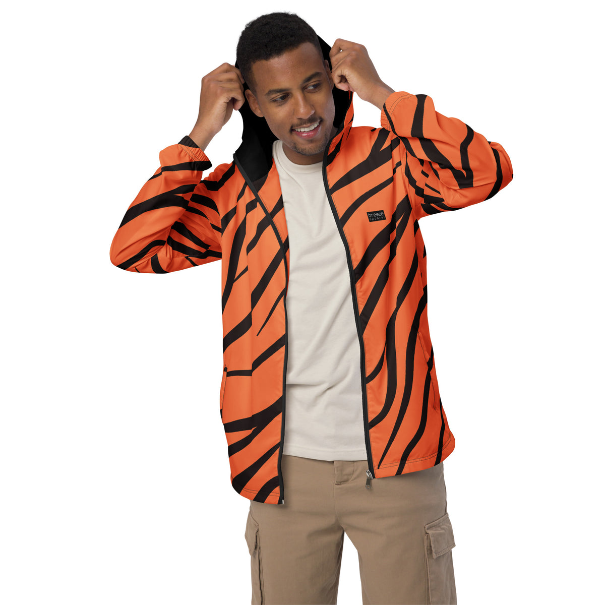 Man wearing jacket with tigerskin pattern.