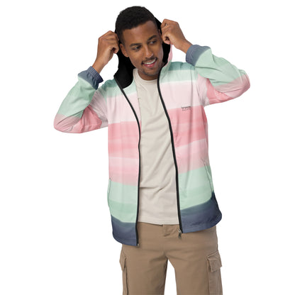 Man wearing jacket with design resembling watercolor consisting of horizontal stripes that are pink, light-green, or gray.