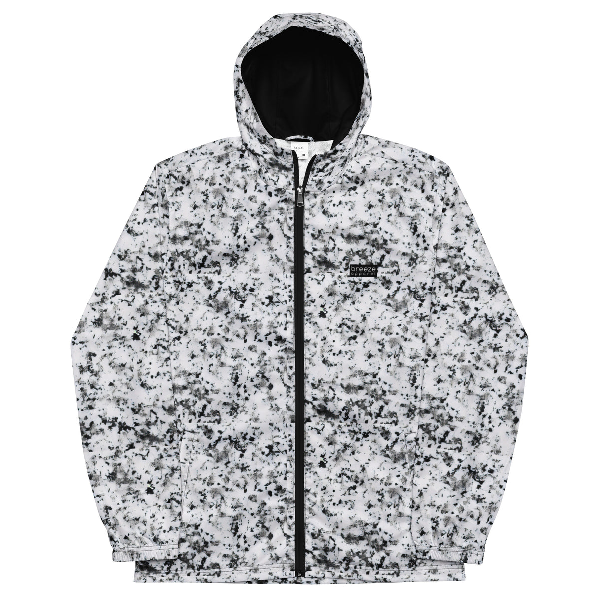 Jacket with pattern of black splotches on a white background.