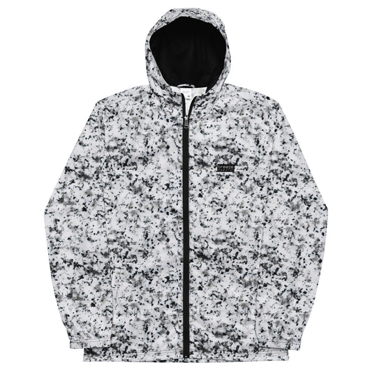 Jacket with pattern of black splotches on a white background.