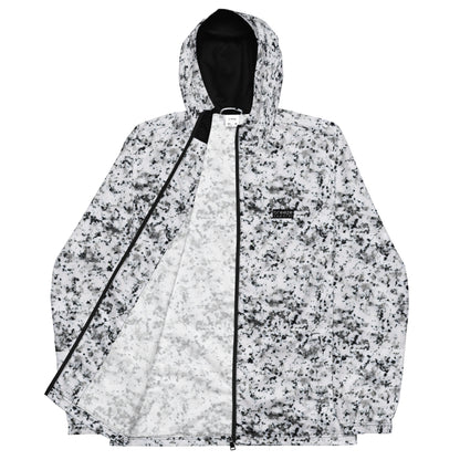 Jacket with pattern of black splotches on a white background.