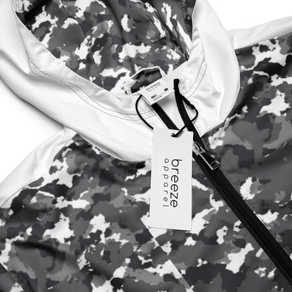 Close-up of jacket that has a black-gray-white camouflage pattern on hood interior and top; rest is white.