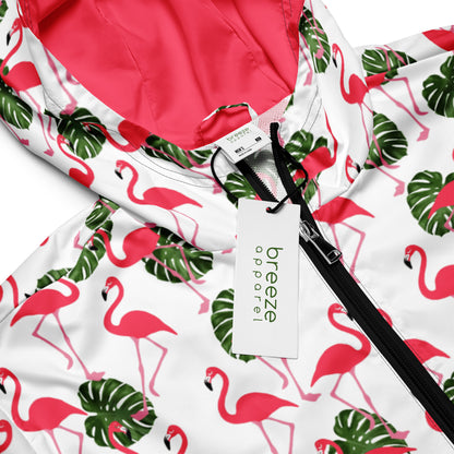 Jacket with pattern of pink flamingos and green foliage set on a white background.