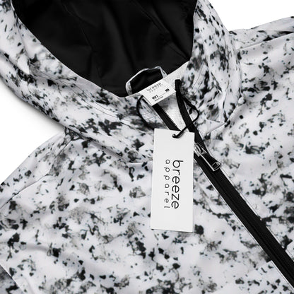 Jacket with pattern of black splotches on a white background.