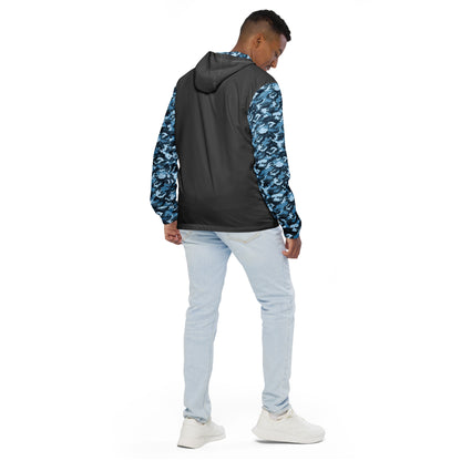 Rear view of man wearing jacket that has a gray back and a navy camouflage pattern on the sleeves.