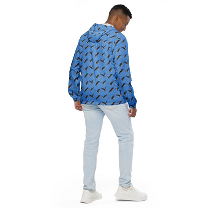 Man wearing blue jacket with pattern of bald eagles.
