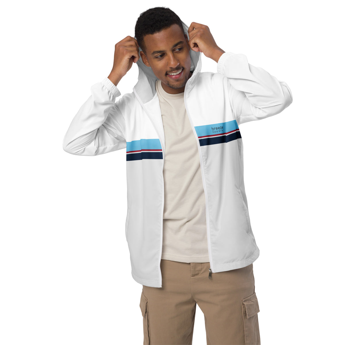 Man wearing jacket whose bottom 3/4 is light gray and top is white, separated by blue, red, white, and navy stripes.