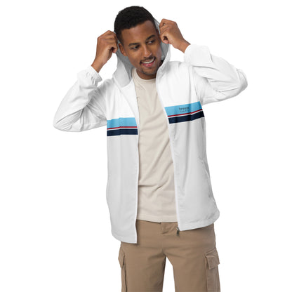 Man wearing jacket whose bottom 3/4 is light gray and top is white, separated by blue, red, white, and navy stripes.