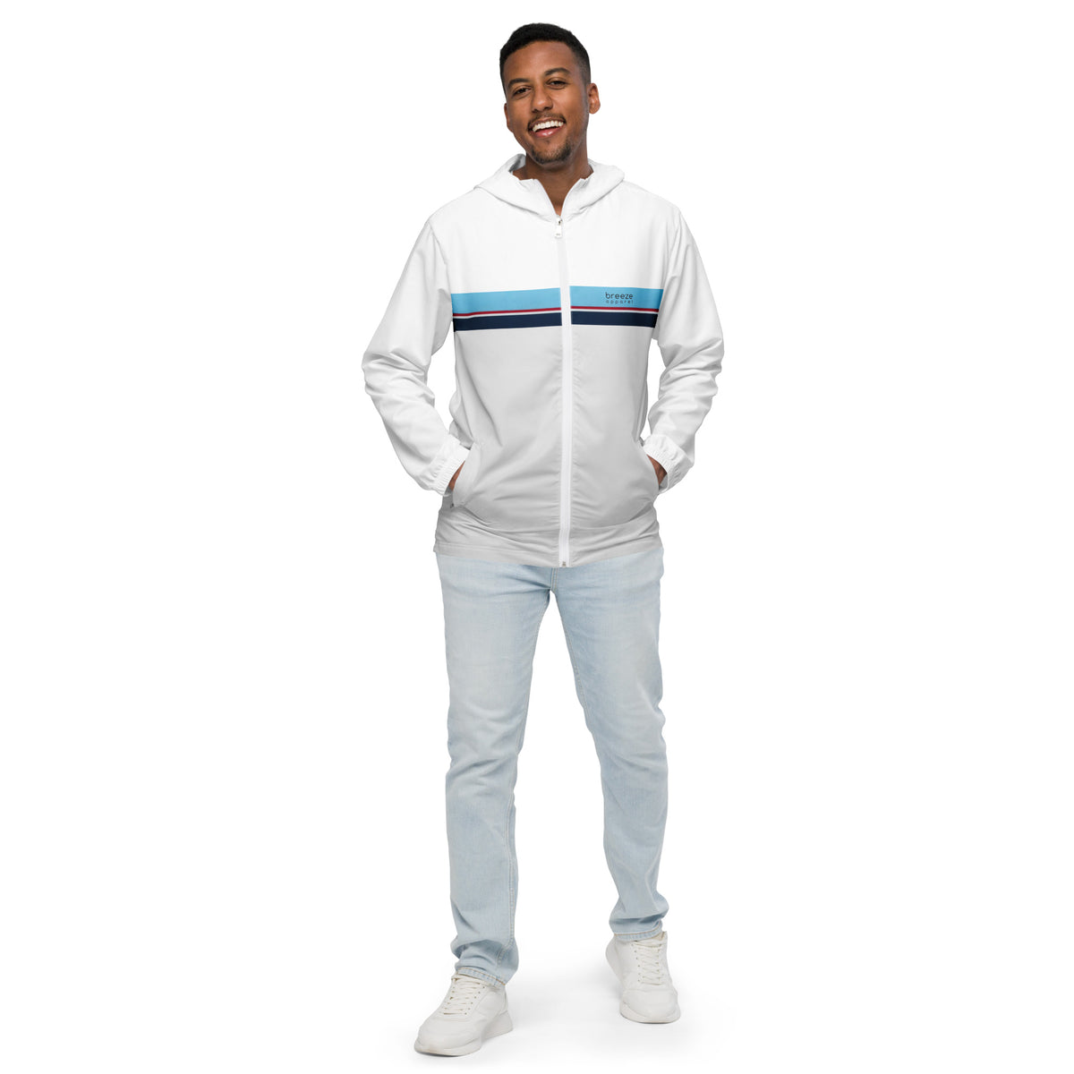 Man wearing jacket whose bottom 3/4 is light gray and top is white, separated by blue, red, white, and navy stripes.