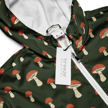 Jacket with pattern of mushrooms set on a green background.