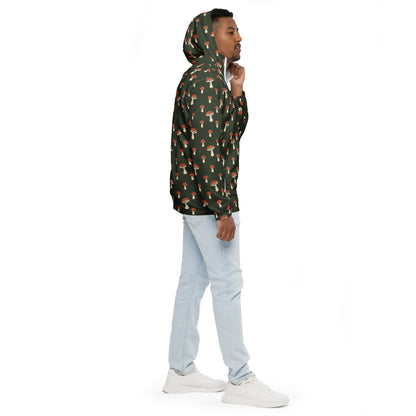 Man wearing jacket with pattern of mushrooms set on a green background.