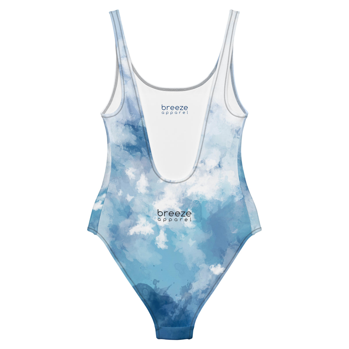 Back of a white, one-piece swimsuit that has a blue, watercolor-style design.