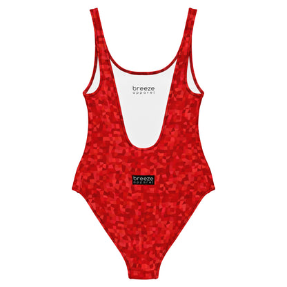 Back of one-piece swimsuit with an all-over, red geometric pattern.