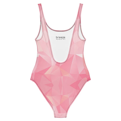 Back of one-piece swimsuit with all-over, pink geometric pattern.