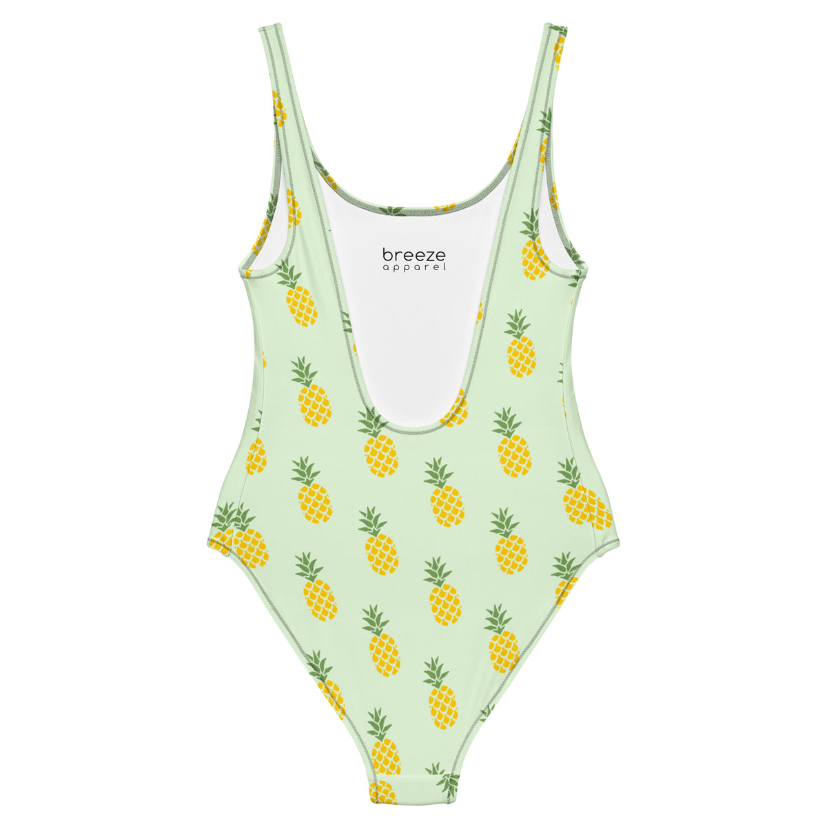 Light-green, one-piece swimsuit with pattern of pineapples.