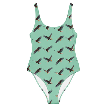 Green one-piece swimsuit with pattern of bald eagles.