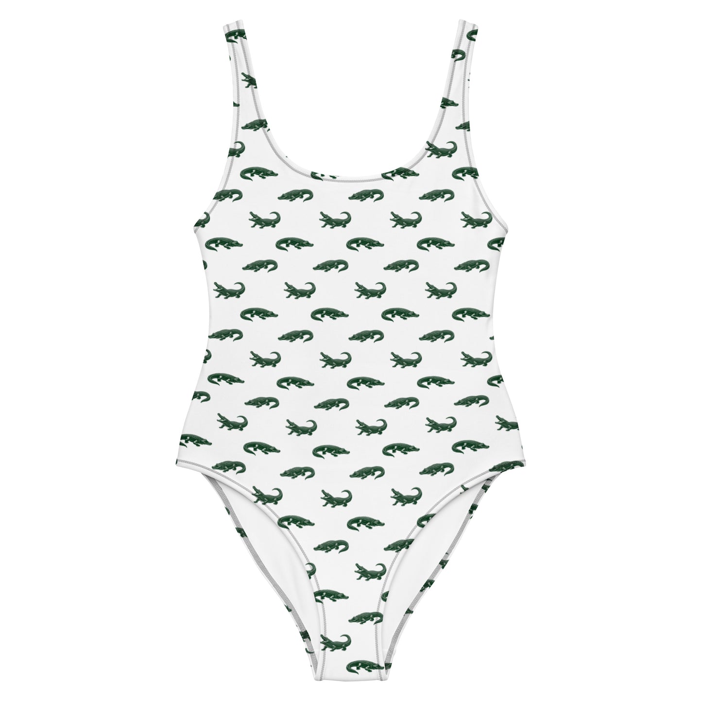 White one-piece swimsuit with pattern of green alligators.