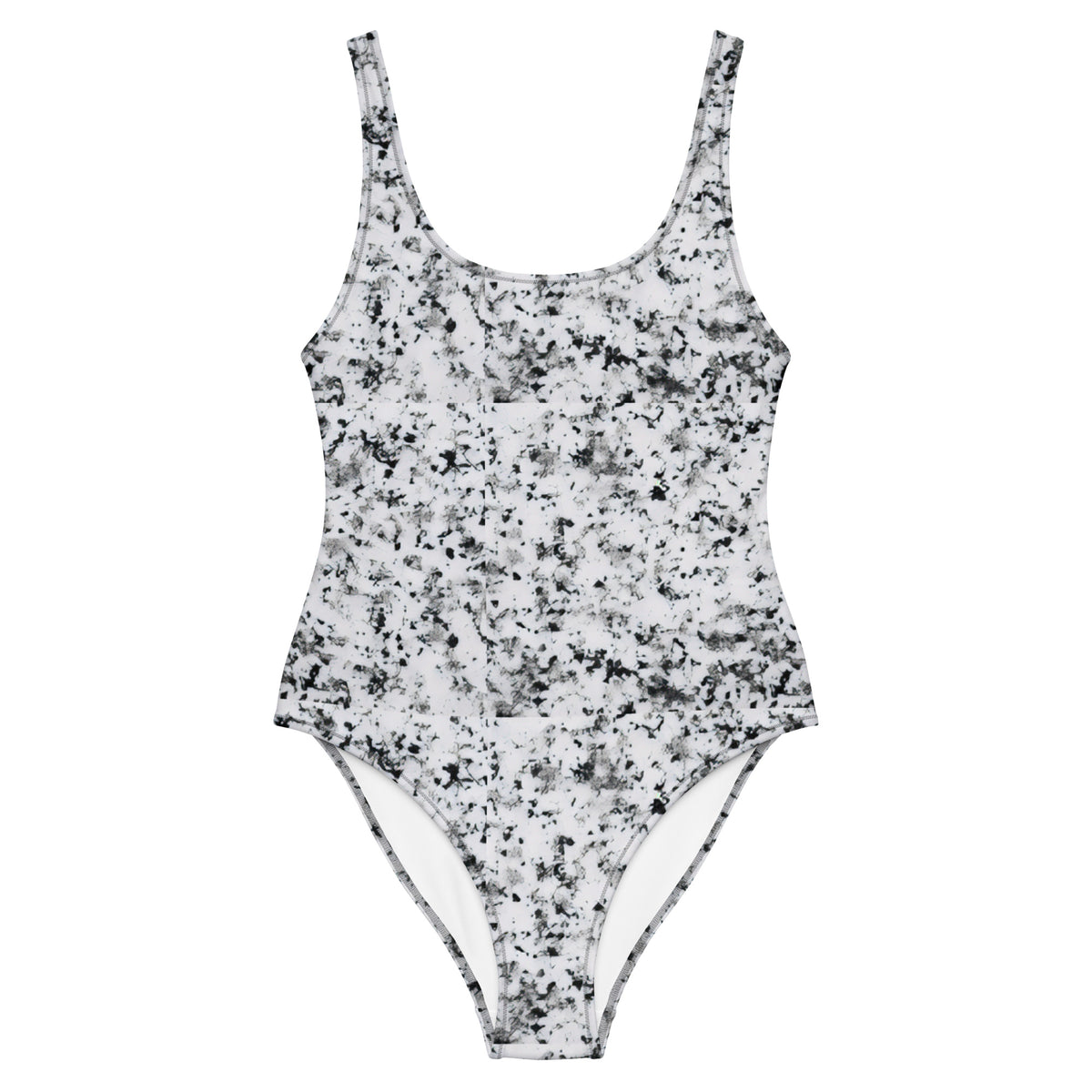 One-piece swimsuit with pattern of black splotches set on a white background.