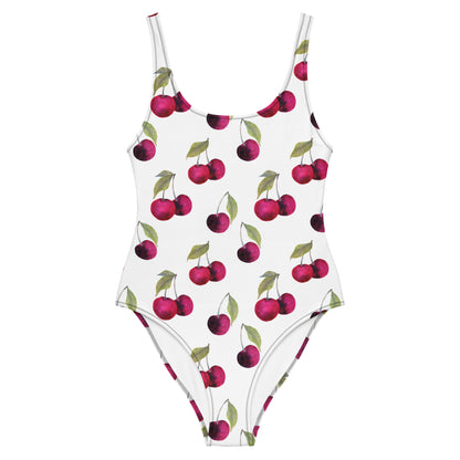 White, one-piece swimsuit with pattern of cherries.