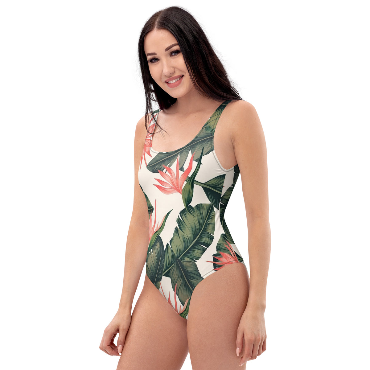Woman wearing one-piece swimsuit with tropical floral pattern.