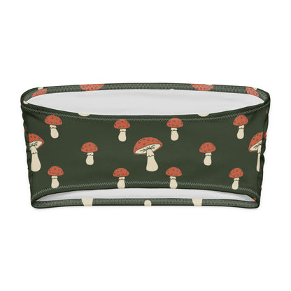 Back of bandeau bikini top with all-over design of mushrooms set on a dark-green background.