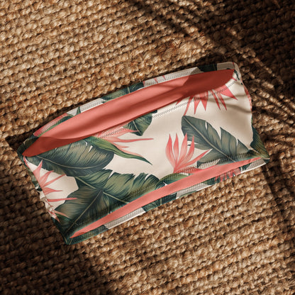 Bandeau bikini top with tropical floral pattern.