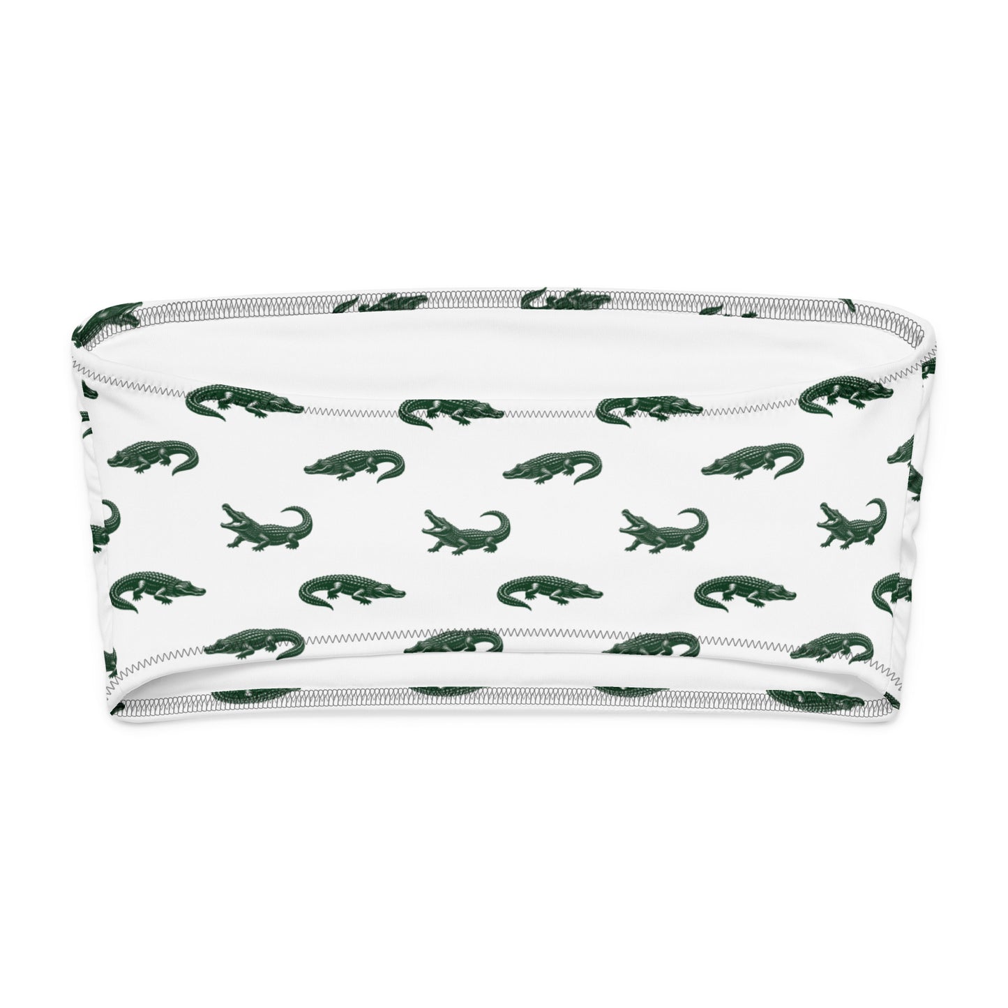 White bikini top with pattern of green alligators.
