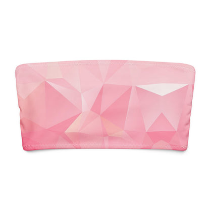 Bandeau bikini top with pink geometric pattern.