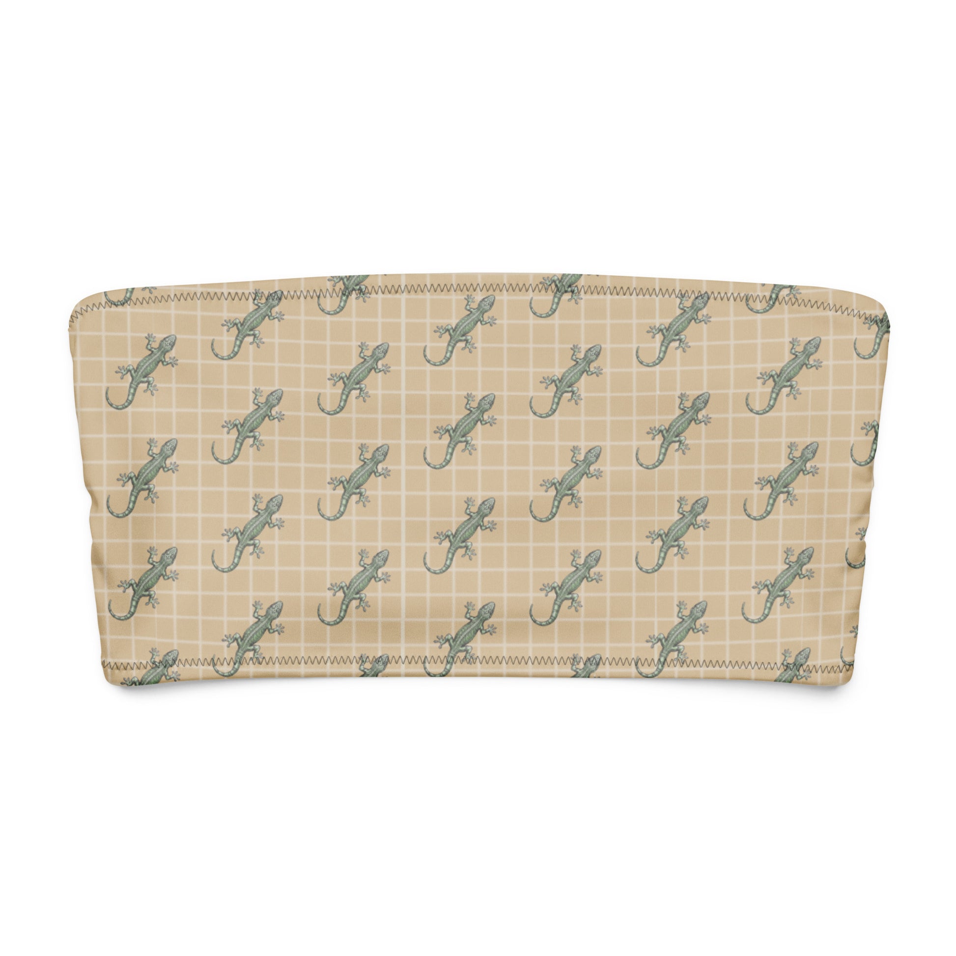 Beige bikini top with pattern of green geckos.