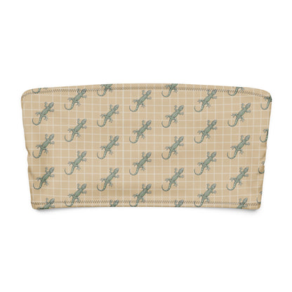 Beige bikini top with pattern of green geckos.