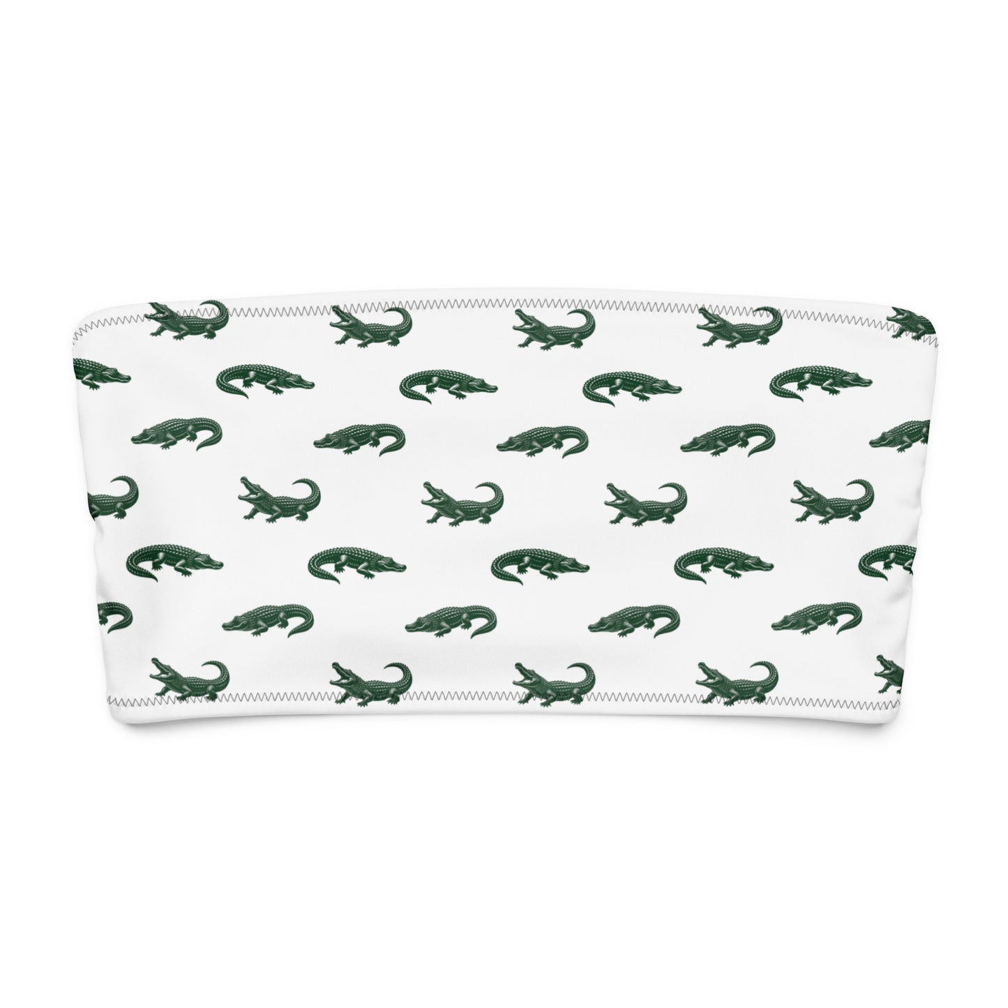 White bikini top with pattern of green alligators.
