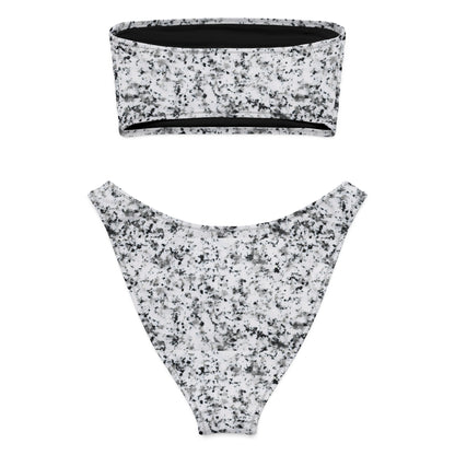 Back of bandeau bikini with pattern of black splotches set on a white background.