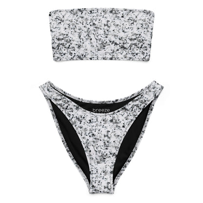 Bandeau bikini with pattern of black splotches set on a white background.