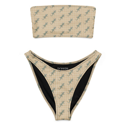 Beige bikini with pattern of green geckos.