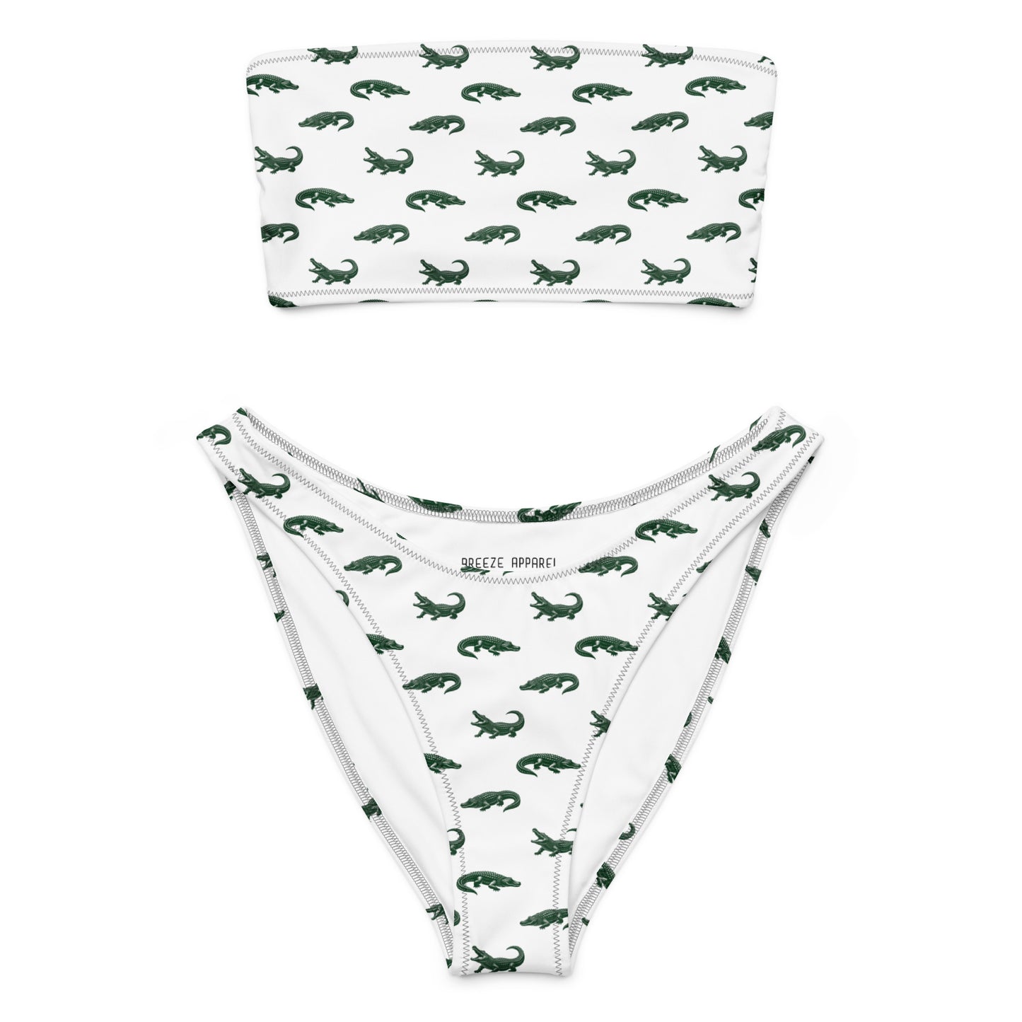 White bikini with pattern of green alligators.