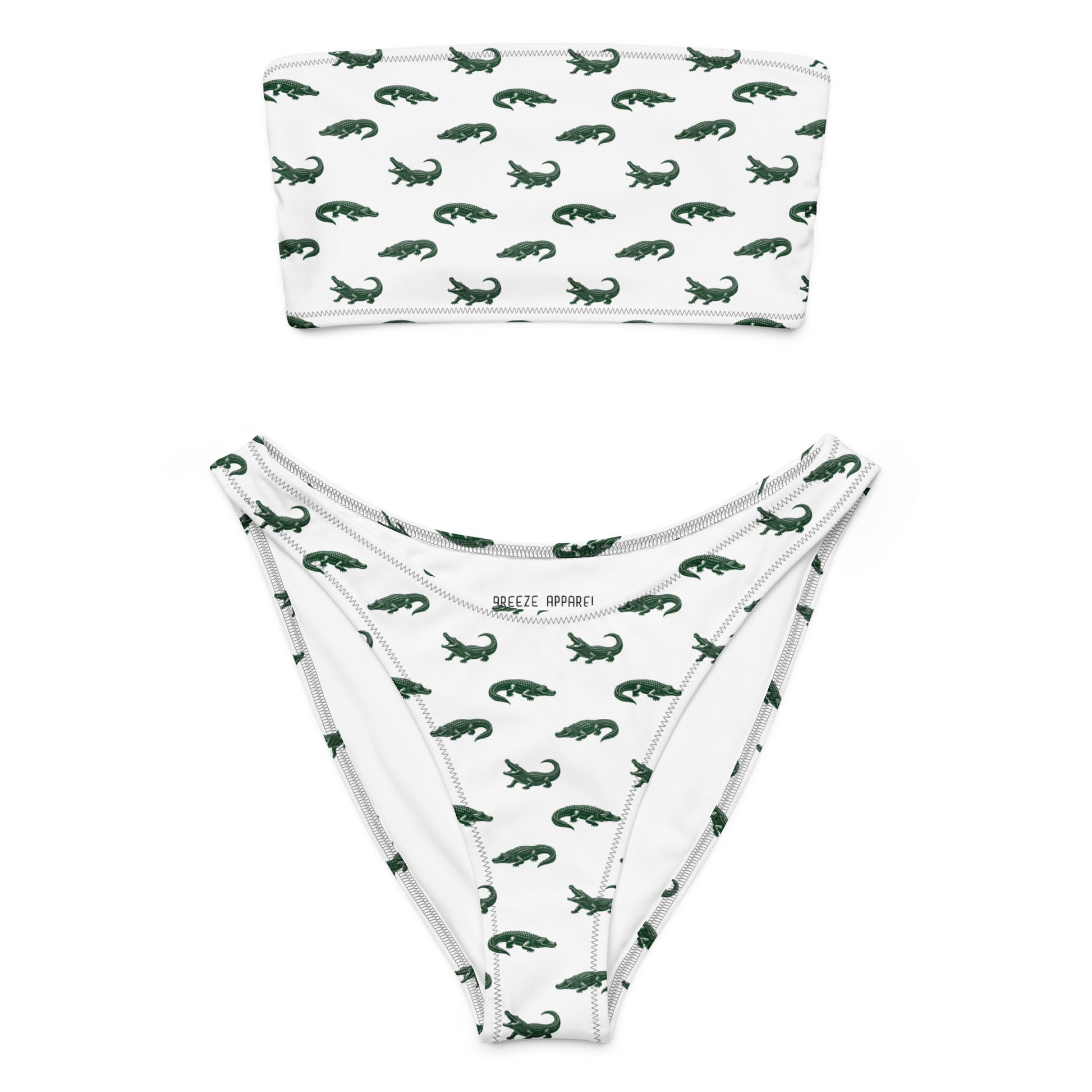 White bikini with pattern of green alligators.