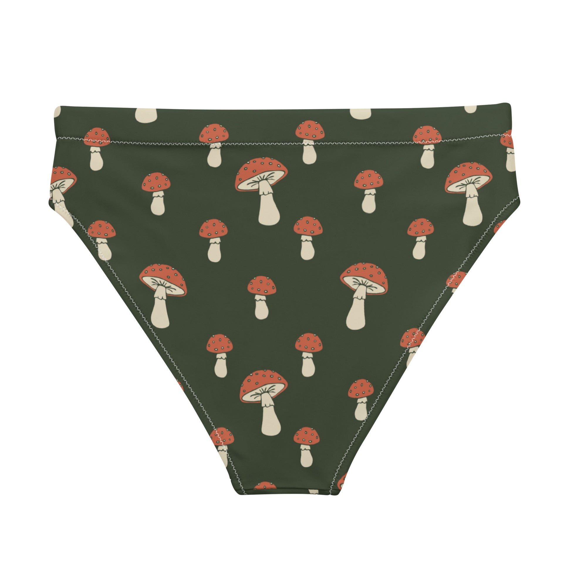 Back of bikini bottom with pattern of mushrooms set on a green background.