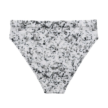 Back of bikini bottom with pattern of black splotches set on a white background.