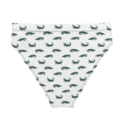 White bikini bottom with pattern of green alligators.
