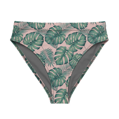 Bikini bottom with pattern of green palm leaves set on a pink background.