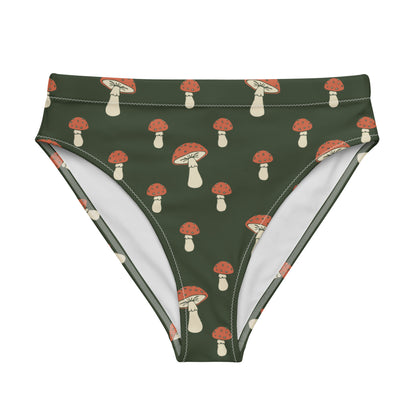 Bikini bottom with pattern of mushrooms set on a green background.