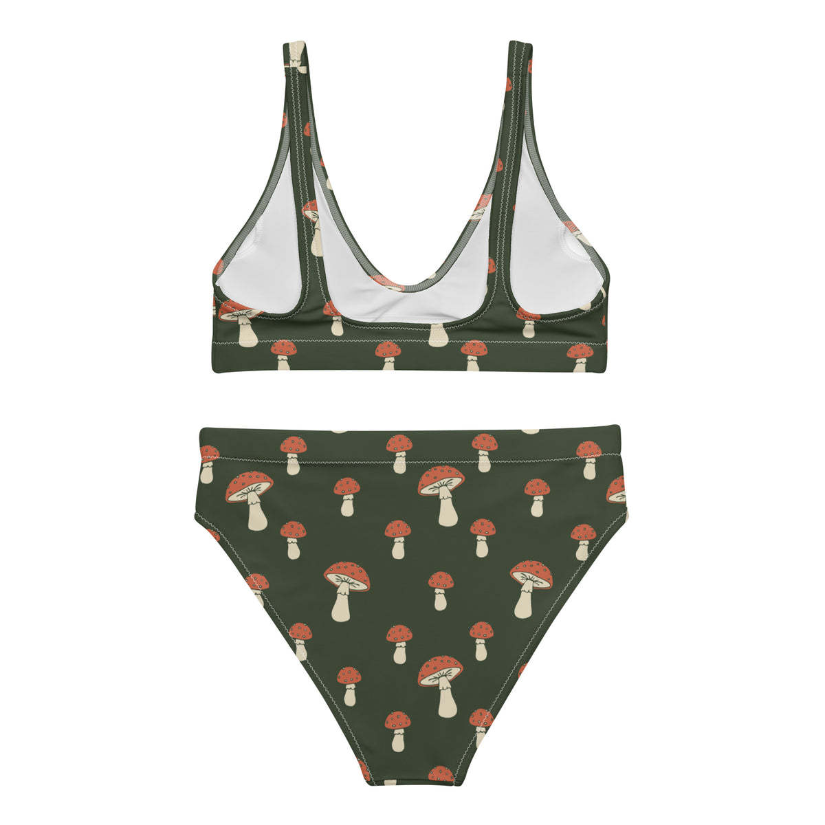 Back of bikini with pattern of mushrooms set on a green background.