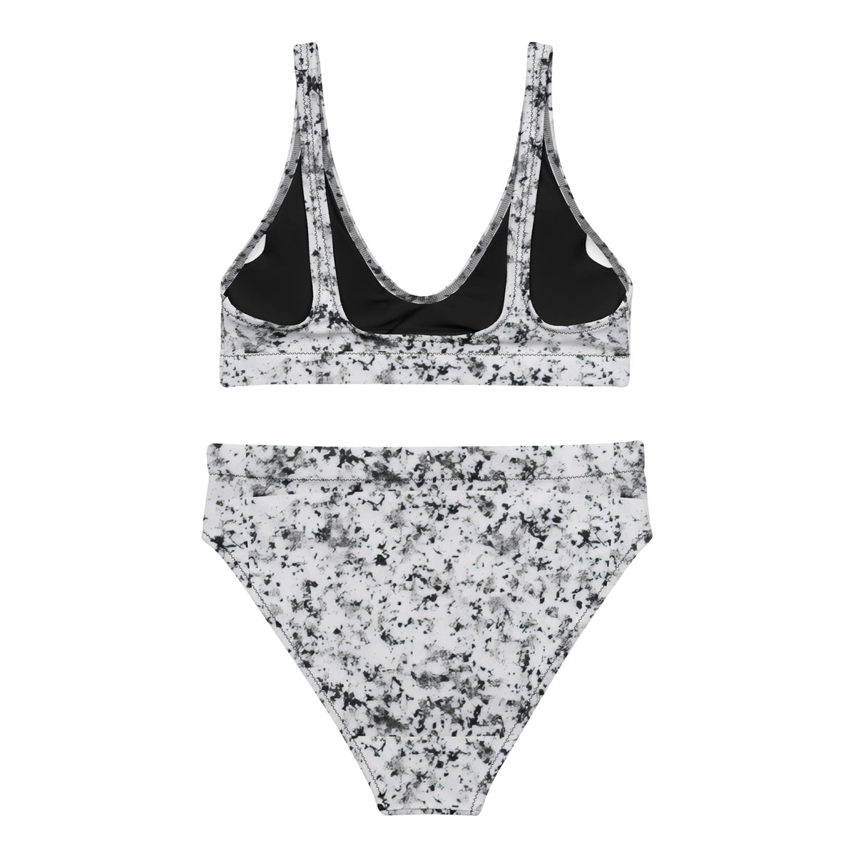 Back of bikini with pattern of black splotches set on a white background.