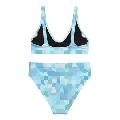 Back of bikini with cyan geometric pattern.