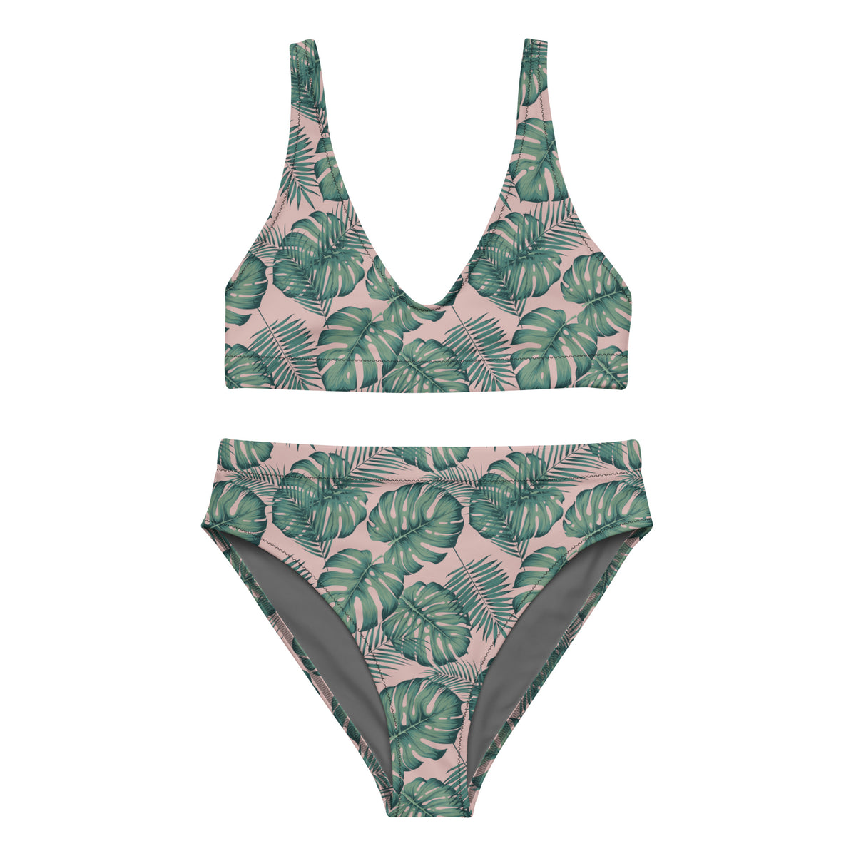 Bikini with pattern of green palm leaves set on a pink background.