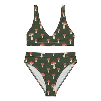 Bikini with pattern of mushrooms set on a green background.