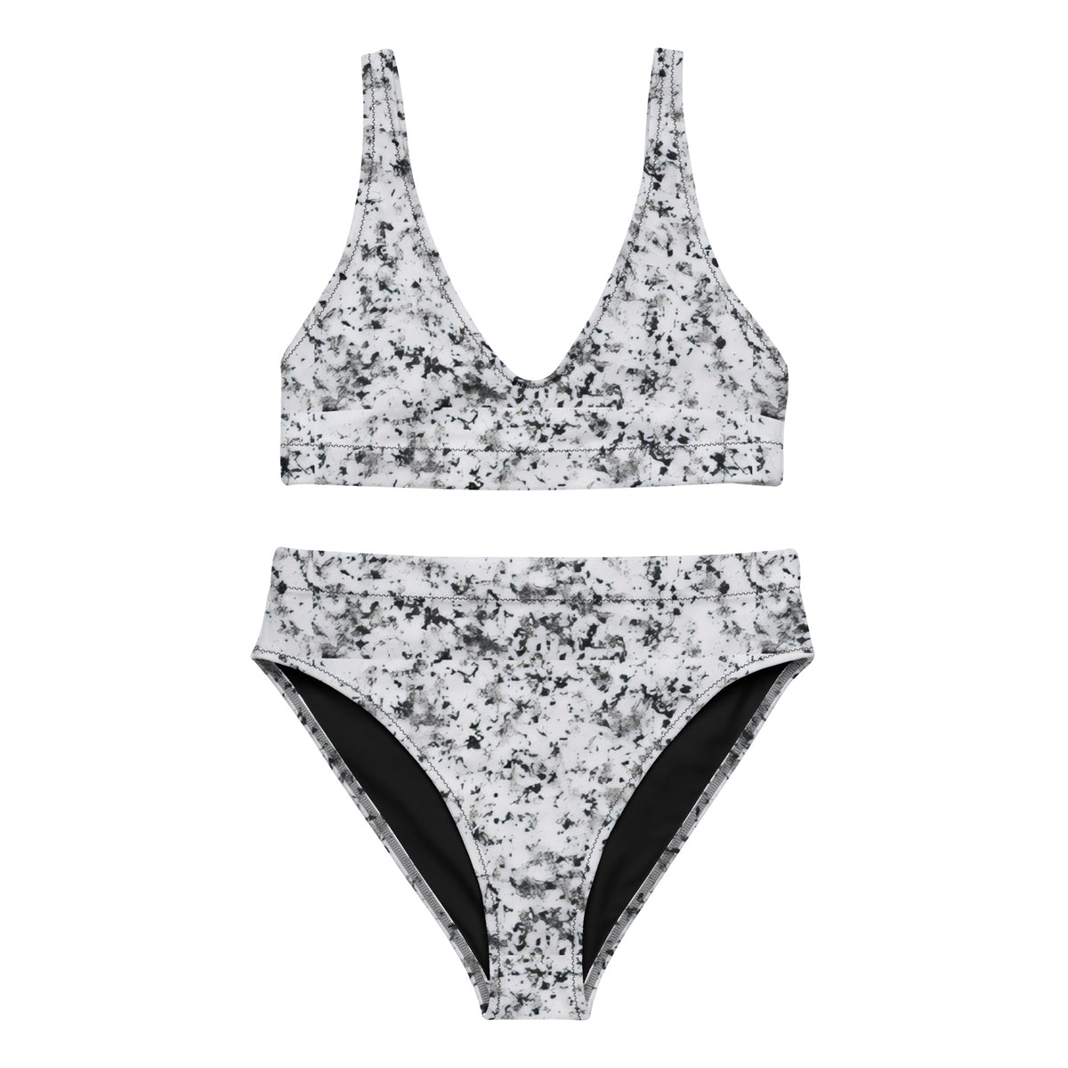 Bikini with pattern of black splotches set on a white background.