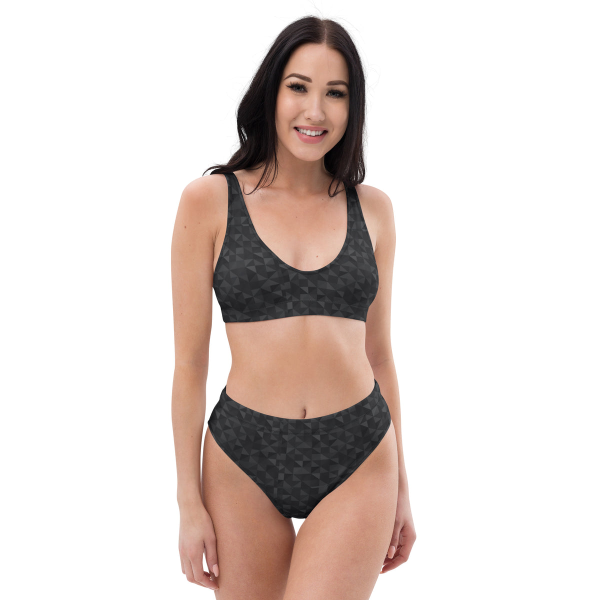 Woman wearing bikini with dark-gray geometric pattern.