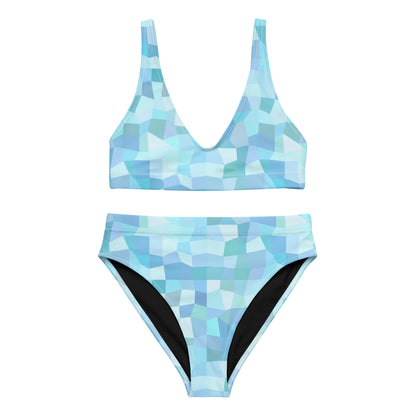 Bikini with cyan geometric pattern.