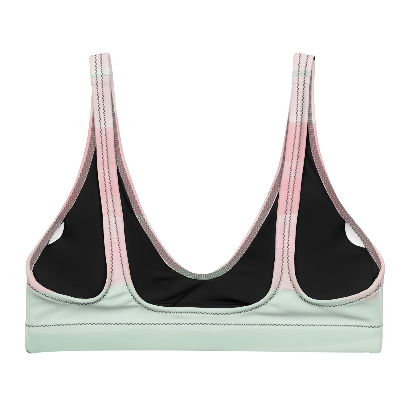 Back of bikini top with design resembling watercolor. Dominant colors are pink and light green.
